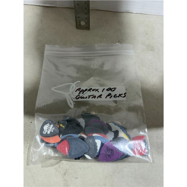 Approximately 100 guitar pics