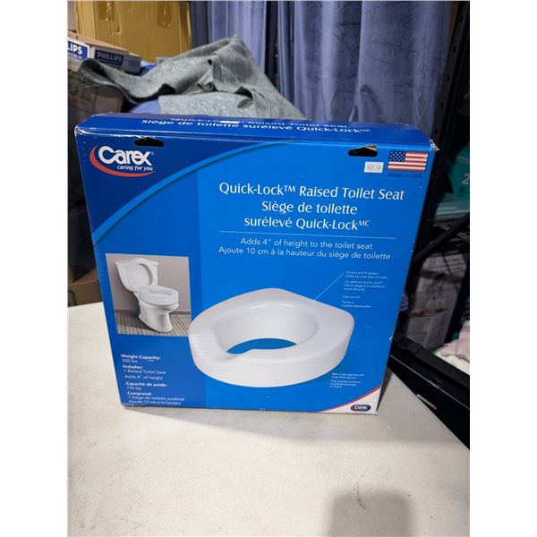 Raised toilet seat