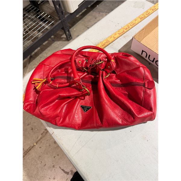 Prada purse has some condition issues on handle see Picture