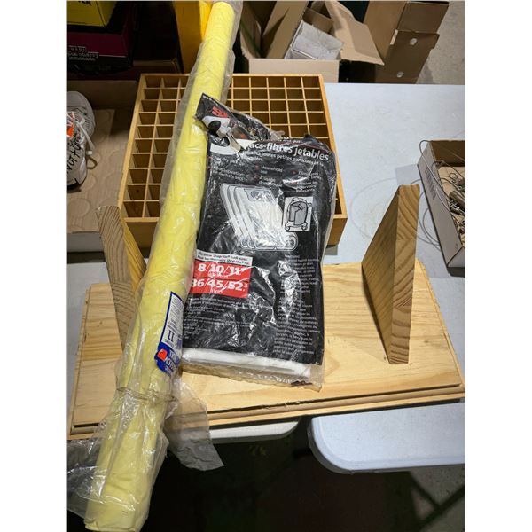 Shelf, organizer, vacuum bags, and table cover roll