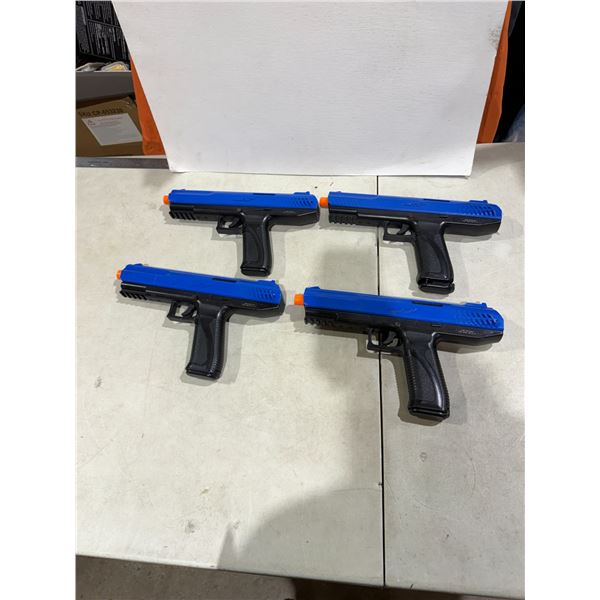 appears to be a blue-and-black JT SplatMaster z100 .50-caliber spring-action paintball pistol