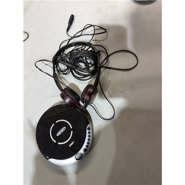 Jensen CD player with a set of headphones