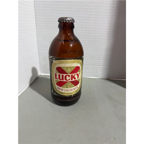Full 1970s Lucky lager stubby