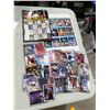 Image 1 : Sports cards and books
