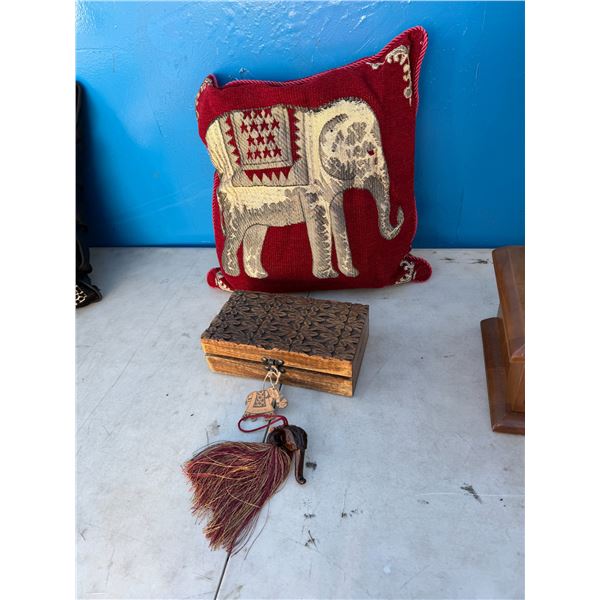 Carved wood box and elephant themed decor