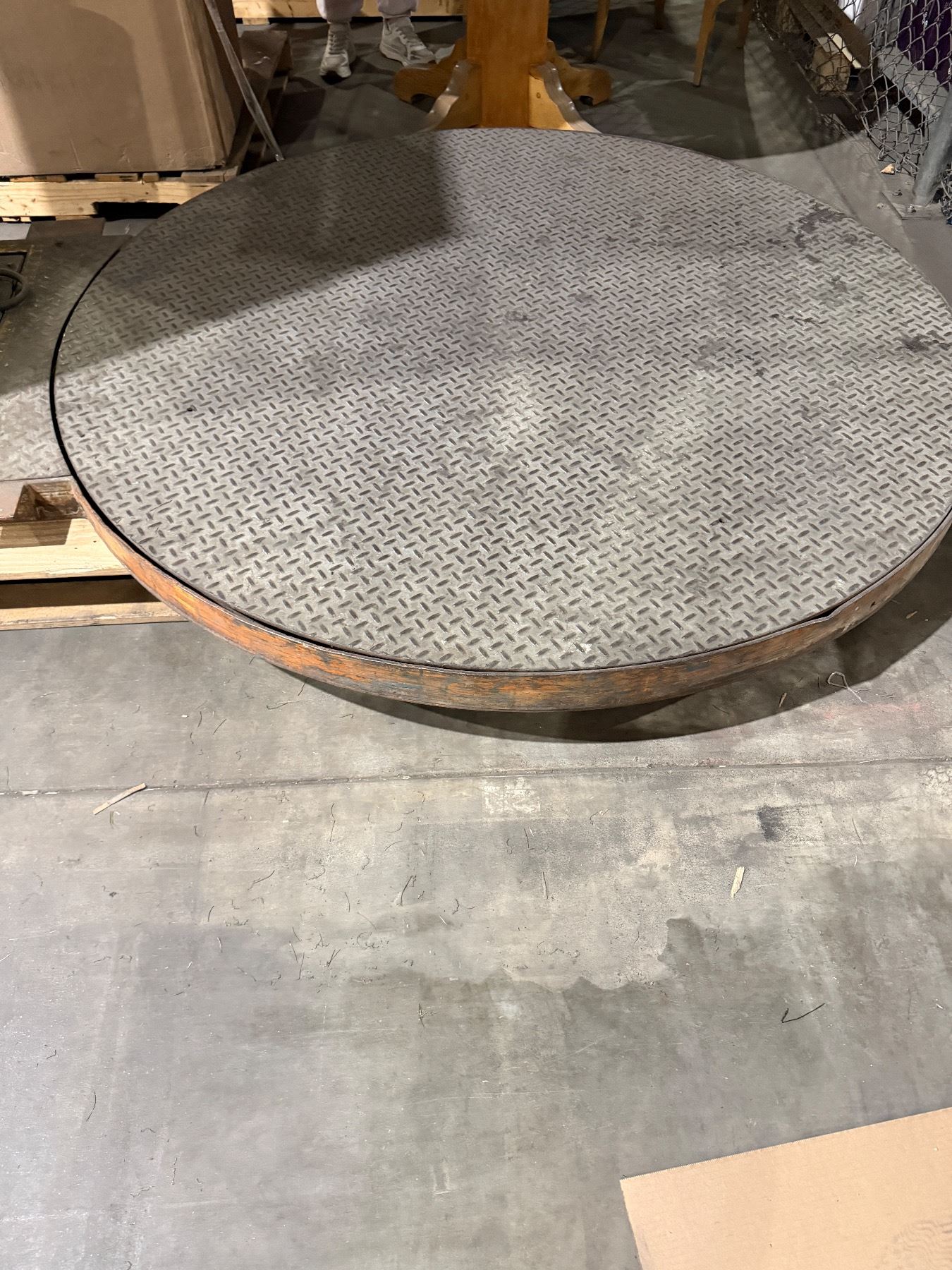 Economaster turntable stretch wrapper, which is an industrial machine ...