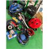 Image 2 : Sports items, new locks, bells, assorted helmets, and bike seat