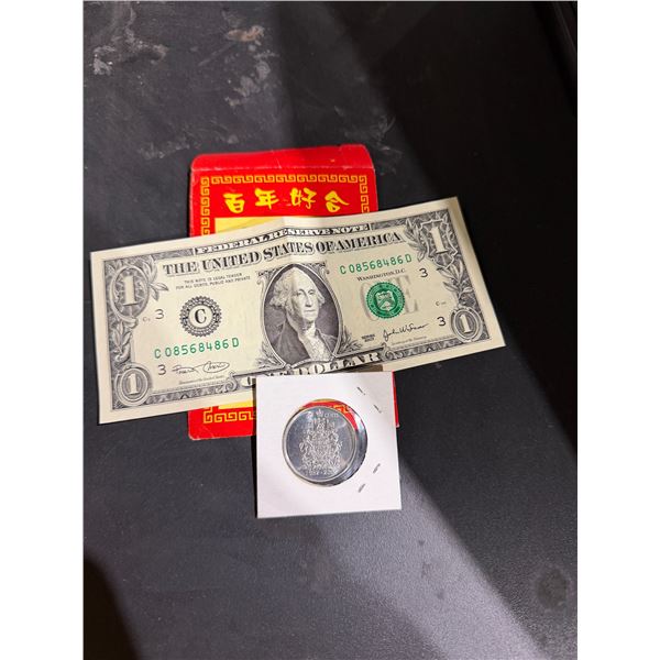 Usa one dollar Bill And Canadian 50 Cent piece