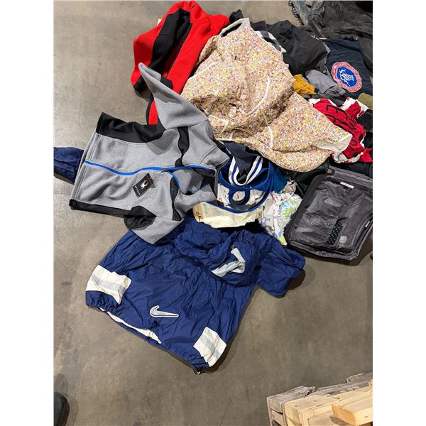 Assorted clothing and suitcase