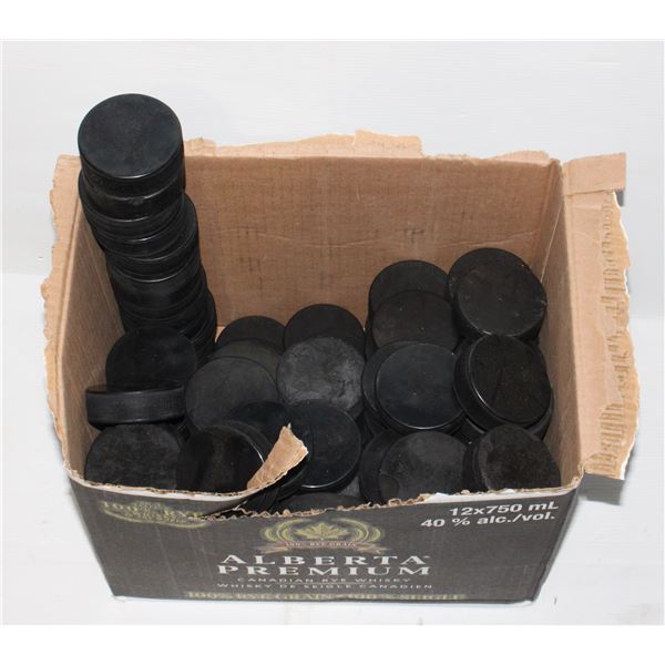 LARGE BOX OF HOCKEY PUCKS