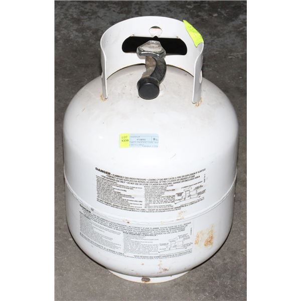 NEAR EMPTY PROPANE TANK. MAY NOT BE REFILLABLE