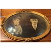 Image 1 : Oval Brass-Framed Sepia Photograph of Man and Woman