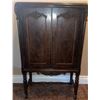 Image 2 : Wooden Cabinet with Double Doors and Metal Wall Art Panel
