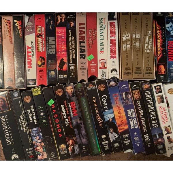 27 VHS Movie Tapes Including Action, Comedy, and Drama