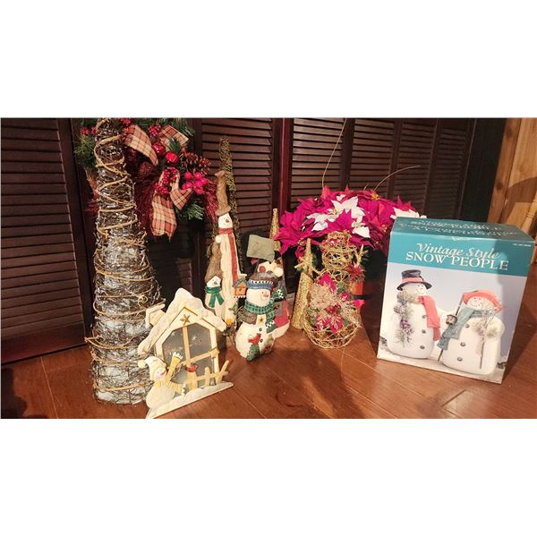 Christmas Decor Including Snowmen Figures, Cone Trees, Wreath, and Poinsettias