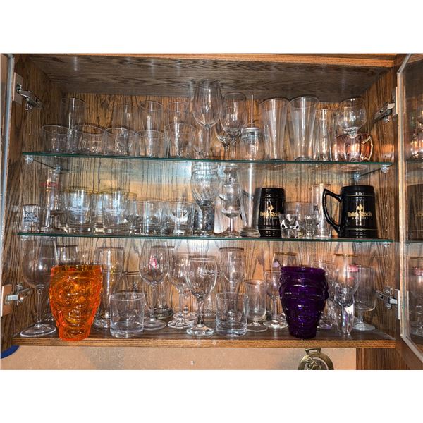 Glassware Collection Including Beer Steins, Skull Tumblers, and Wine Glasses