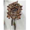 Image 2 : Carved Wood Cuckoo Clock with Animal Motifs and Rotating Figurines