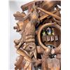 Image 6 : Carved Wood Cuckoo Clock with Animal Motifs and Rotating Figurines