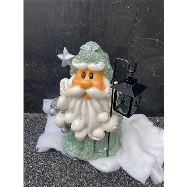Santa Claus Ceramic Figurine With Green Outfit and Lantern