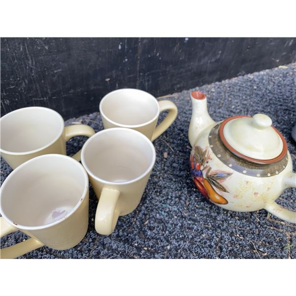 Ceramic Teapot with Fruit Motif and Four Beige Mugs
