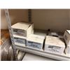 Image 12 : Contents of Shelf: Multiple Capacitors, Fuses, Timers, Contactors, Mufflers, Relays, Hoses, etc  (sh
