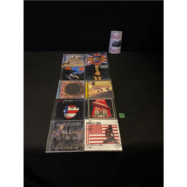 8 Assorted music CDs, rock genre