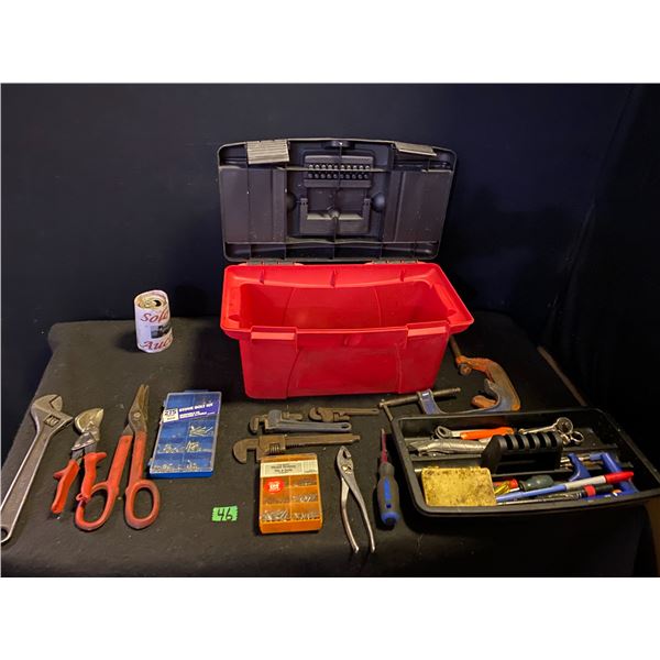 Tool box filled with assorted hand tools