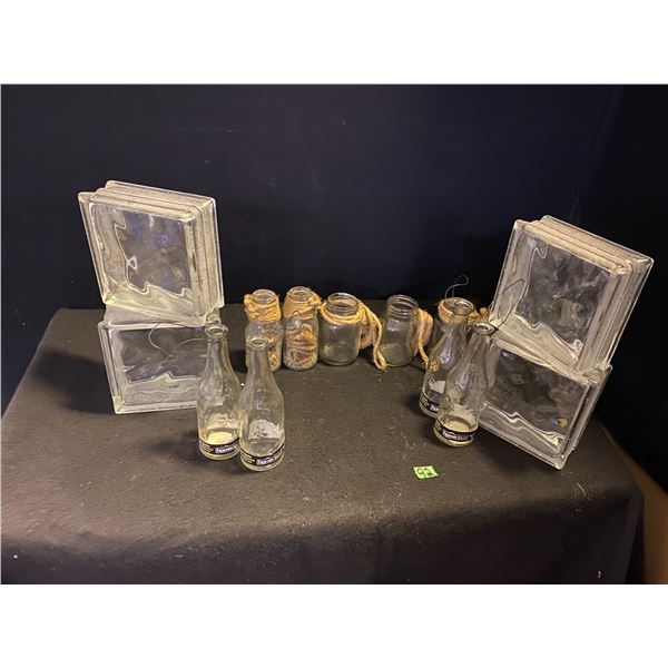 Glass bricks, vintage bottles and jars