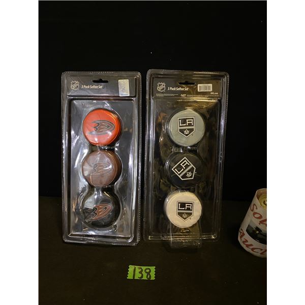 2- 3 piece hockey puck sets