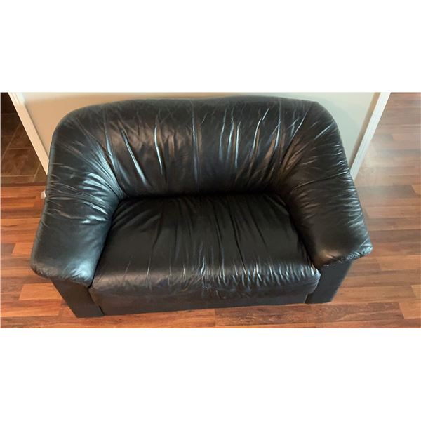 2 Black Leather Couches and a Storage Ottoman