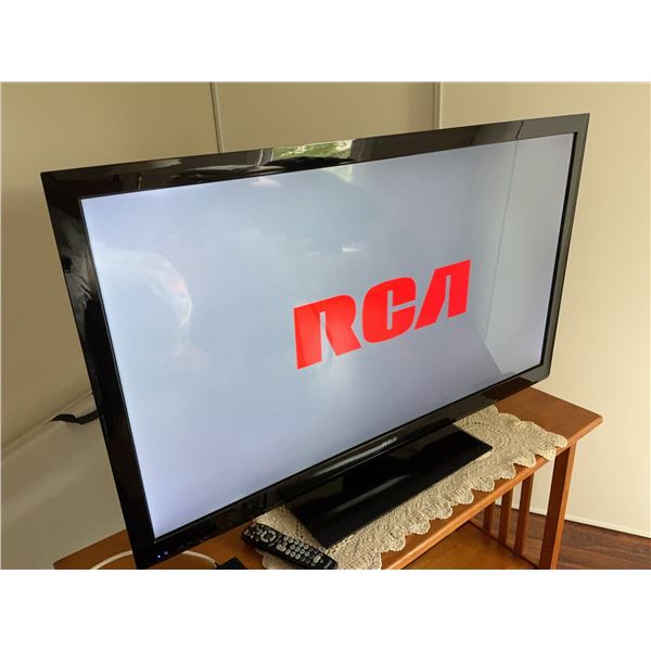 RCA 47-Inch FHD LED TV with Arris DCX3200 Set-Top Box and Stand