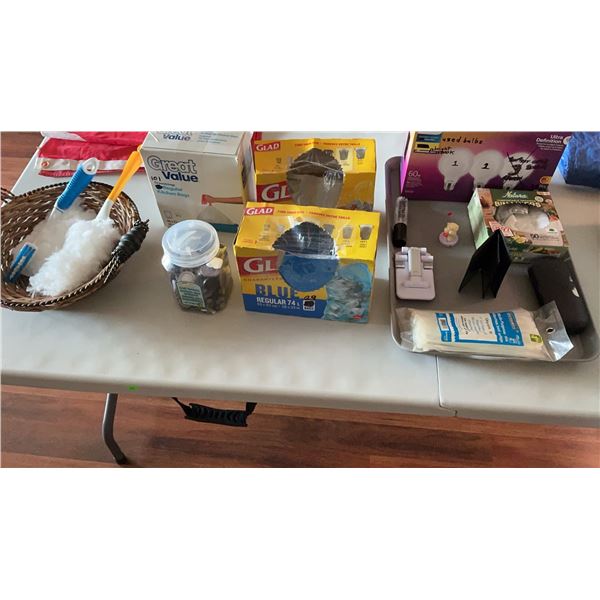 Household Utility Lot With Air Mattress, Tarpaulin, Canadian Flag, and Accessories