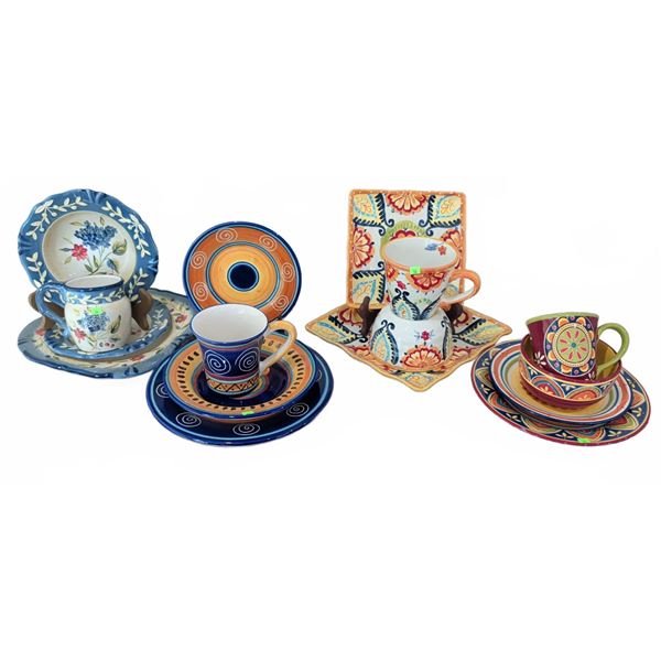 Four Painted Ceramic Place Settings With Cups and Plates