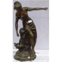 "Woman Sitting on Fountain"