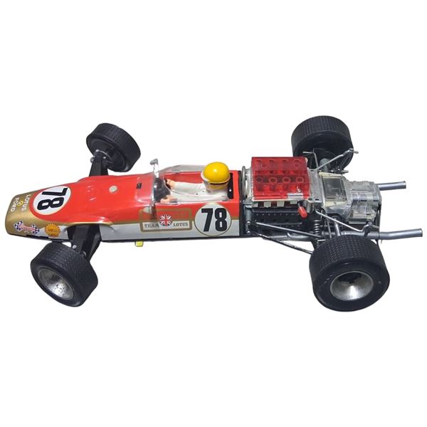 Very rare Lotus Ford F1 racing car, battery powered with box, car is 17" pieces missing as seen
