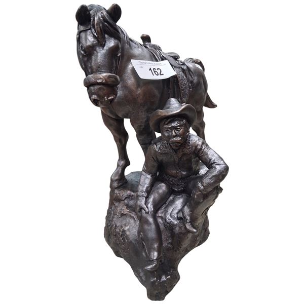 Large resin cowboy and horse sculpture 12"x13"