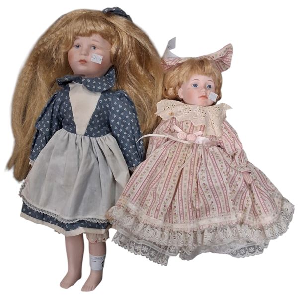 2 vintage porcelain dolls 11"