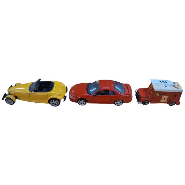 3 collectable die cast cars, largest is 8"