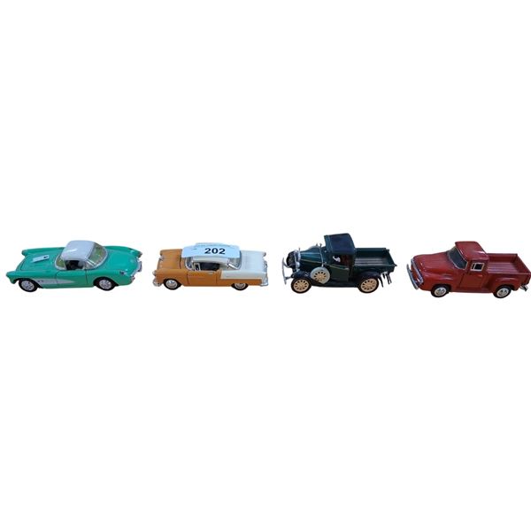 4 vintage die cast cars, each approx 5.5"