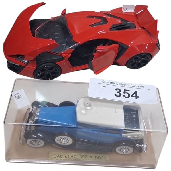 2 die cast cars, longest 9"