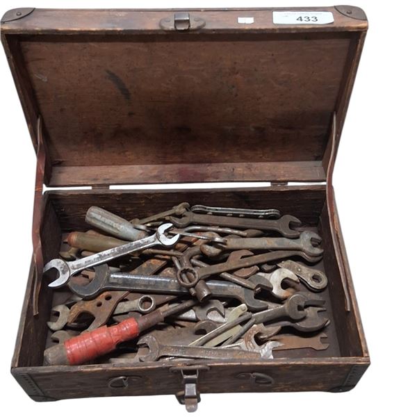 Wooden tool box with vintage tools