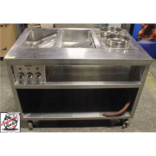 3 WELL STEAM TABLE ON CASTORS