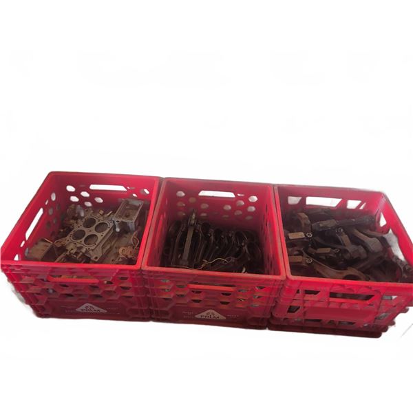 Automotive Engine Parts in Three Red Crates