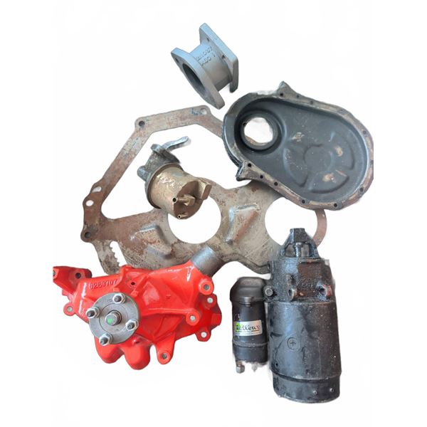 GM Engine Components Including Water Pump, Starter, and Timing Cover