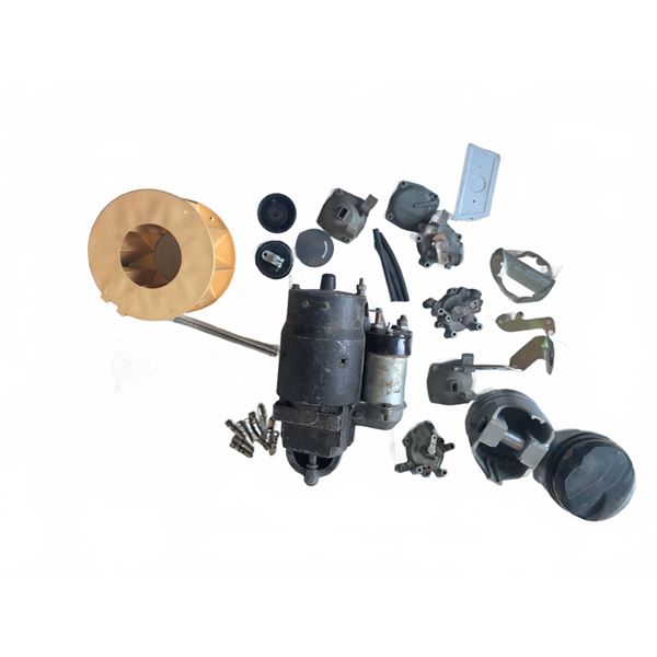Automotive Parts Lot Including Starter, Pistons, Brass Valves, and RGM8-ZC Repair Kit