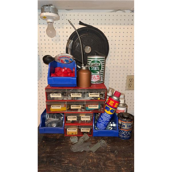 Workbench Lot With Oil Cans, WD-40, Parts Bins, and Assorted Hardware