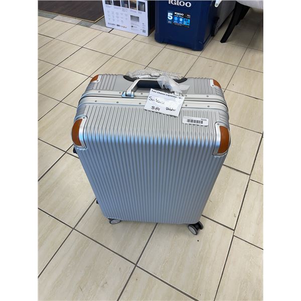 Silver Hardside Spinner Suitcase with Brown Trim