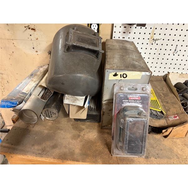 welding rods w/ mask and glasses