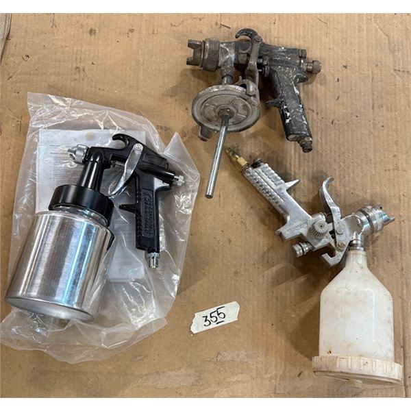 Spray guns, one new- two used