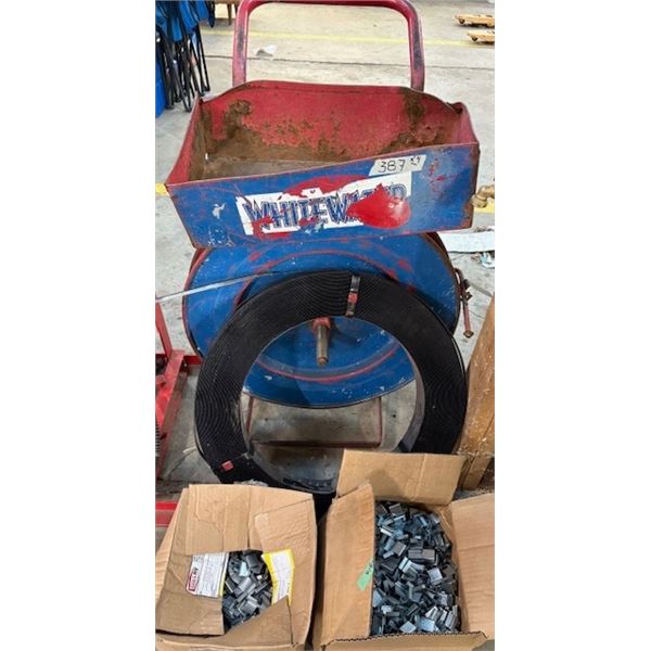 Strapping machine with New strapping and clips